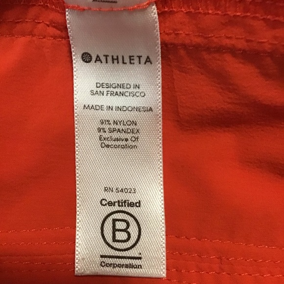 Athleta Ascender Athletic Shorts Orange - Picture 8 of 9